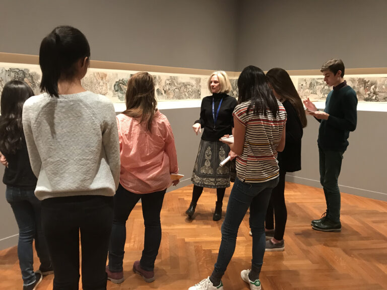 Allison Kemmerer discusses an exhibition with Phillips Academy students