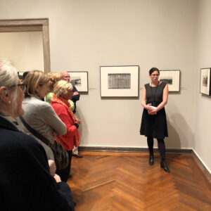 Curator Tessa Hite presents a gallery tour to Friends of the Addison